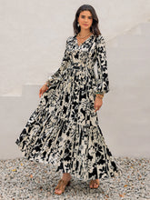 Smocked Printed Tie Neck Long Sleeve Dress Black White OutfitFlow